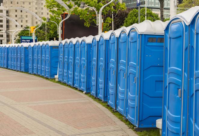 a row of portable restrooms at an outdoor special event, ready for use in Anaheim CA